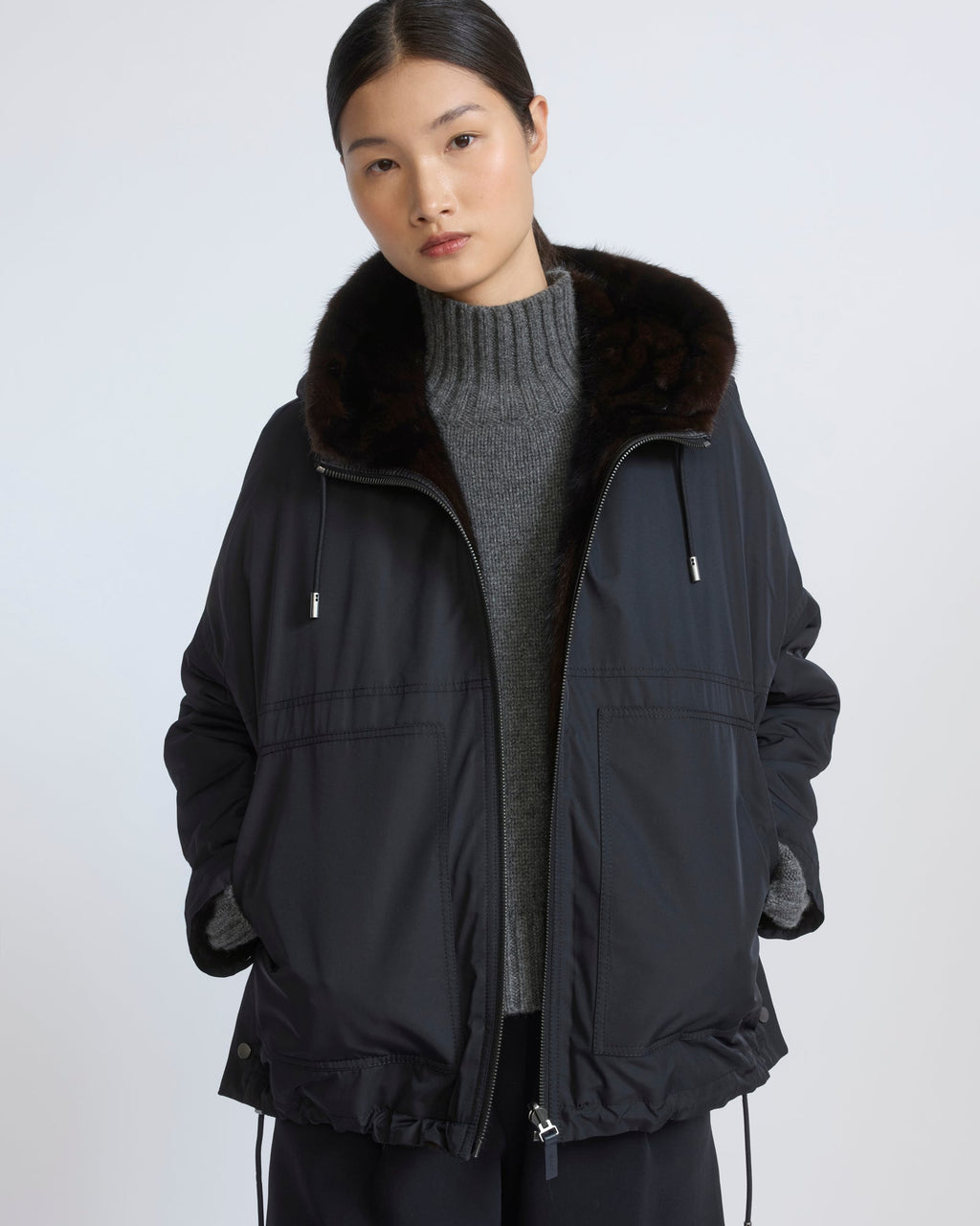 Short reversible water-repellent technical fabric jacket with mink fur