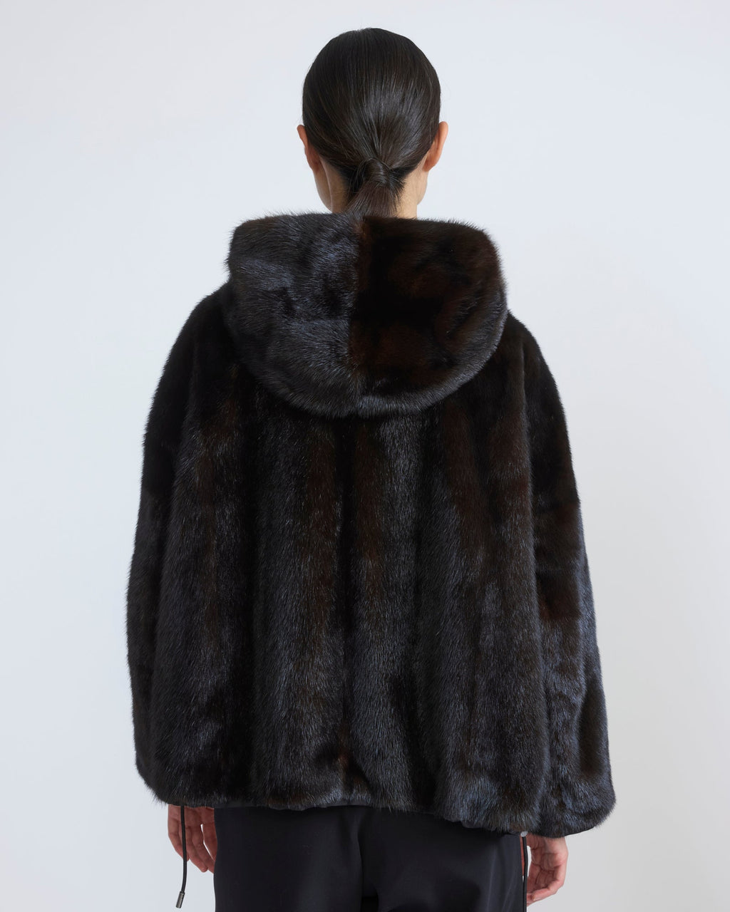 Short reversible water-repellent technical fabric jacket with mink fur