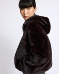 Short reversible water-repellent technical fabric jacket with mink fur