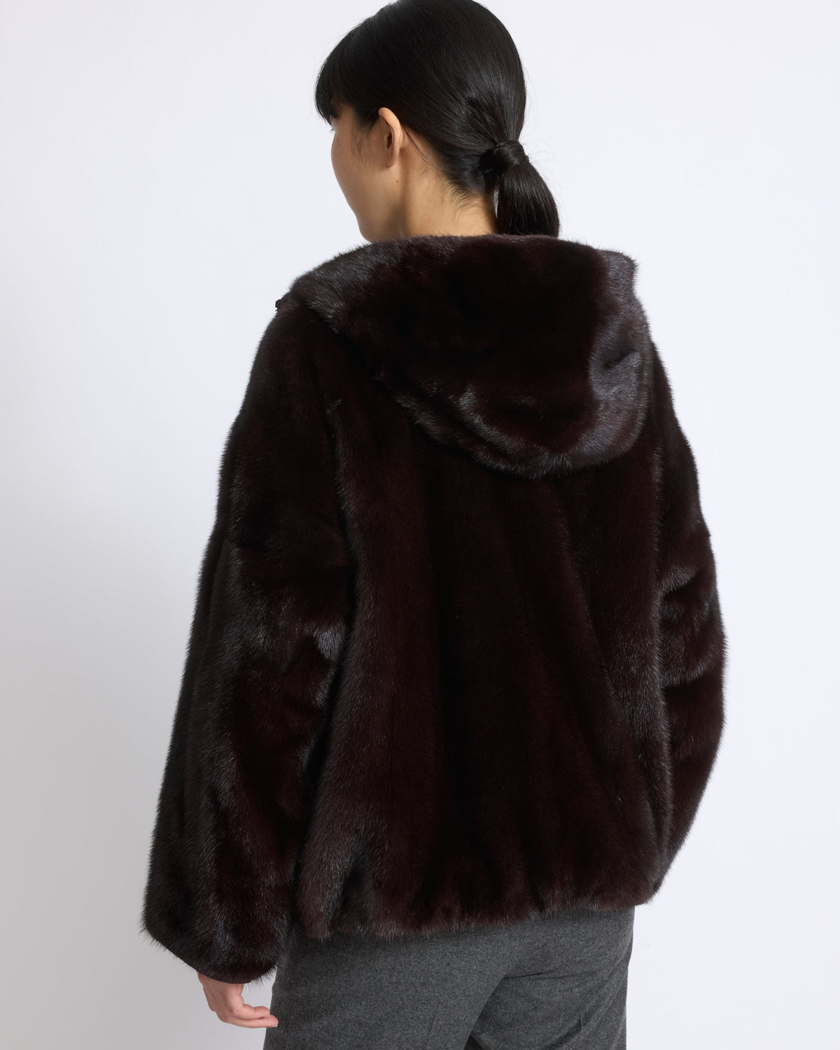 Short reversible water-repellent technical fabric jacket with mink fur