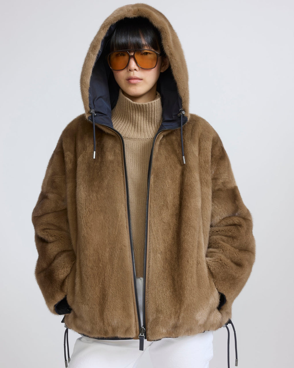 Short reversible water-repellent technical fabric jacket with mink fur