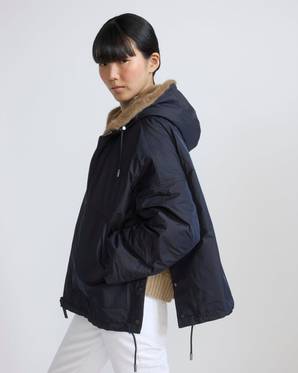 Short reversible water-repellent technical fabric jacket with mink fur