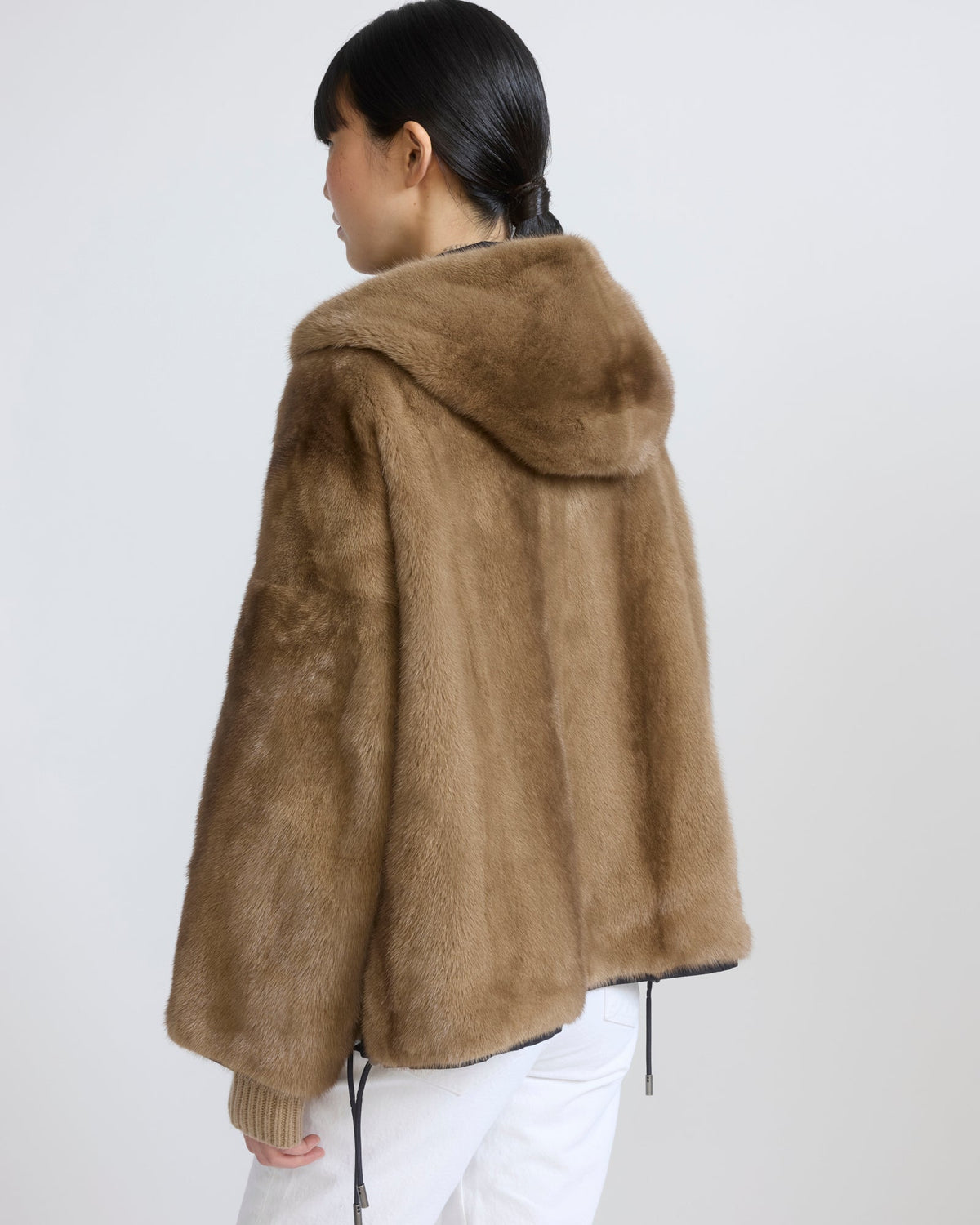 Short reversible water-repellent technical fabric jacket with mink fur