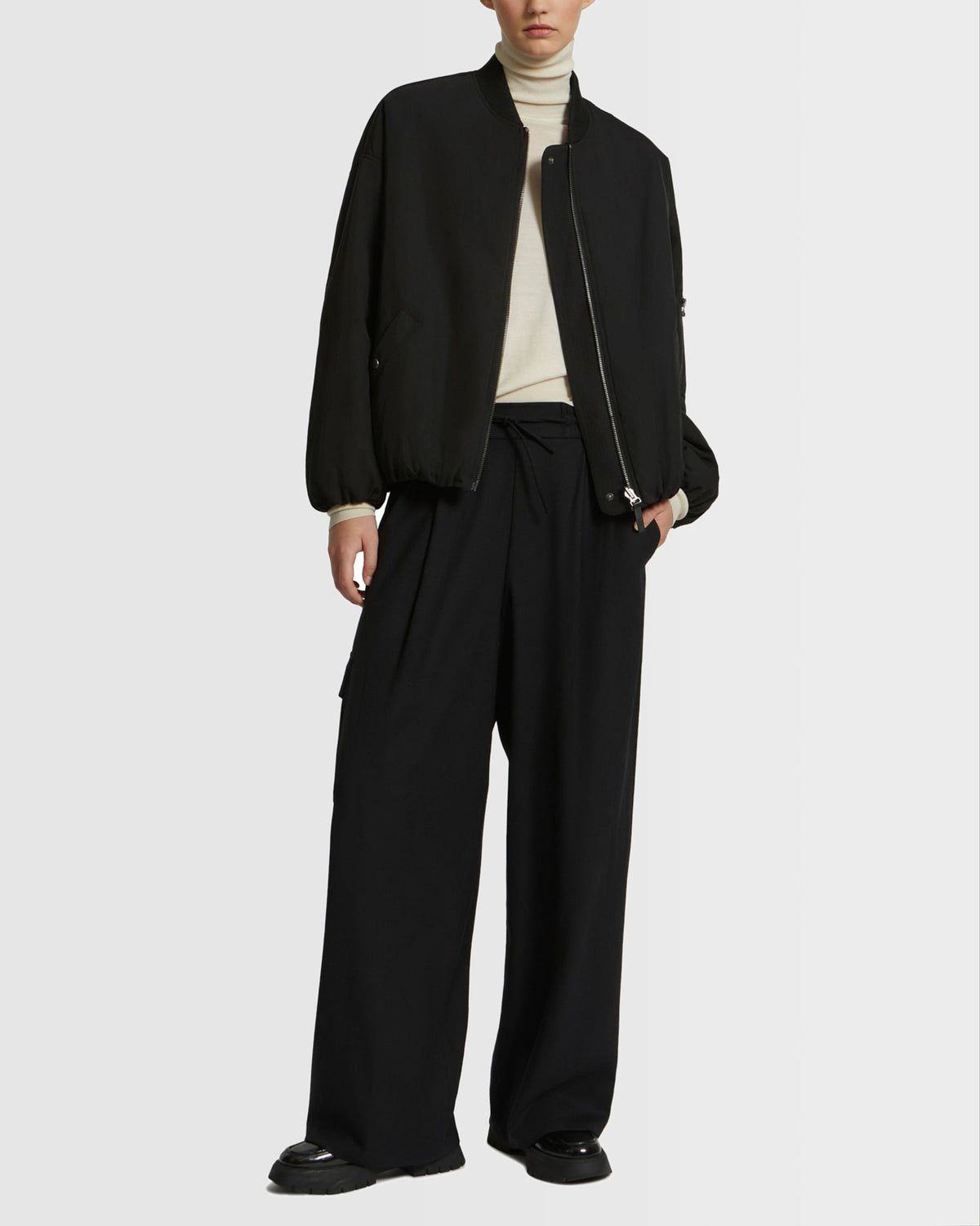 Reversible bomber jacket in water-repellent technical fabric and long-haired mink