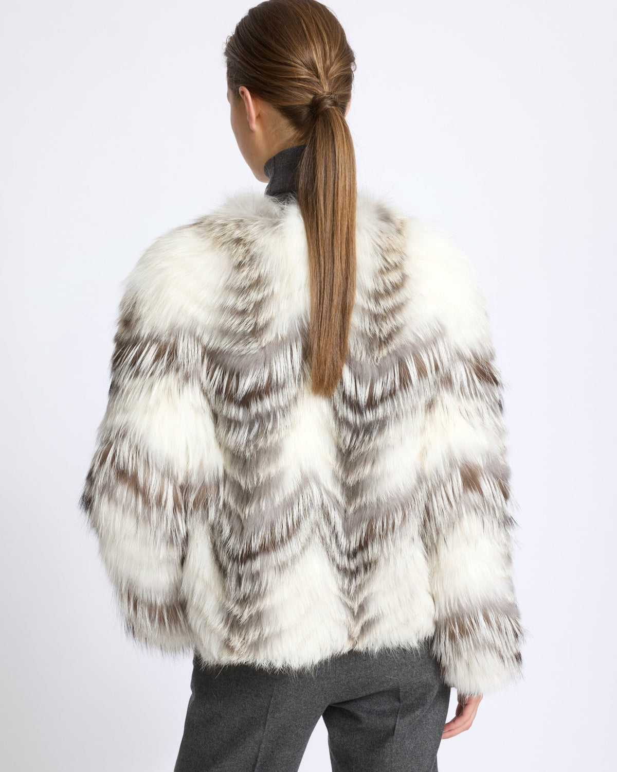 Belted cardigan in merino knit and fox fur