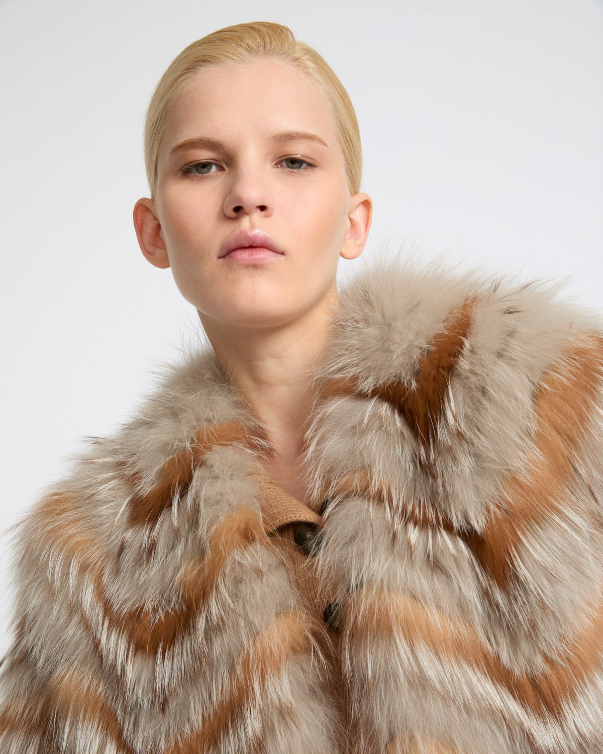 Belted jacket in merino knit and fox fur