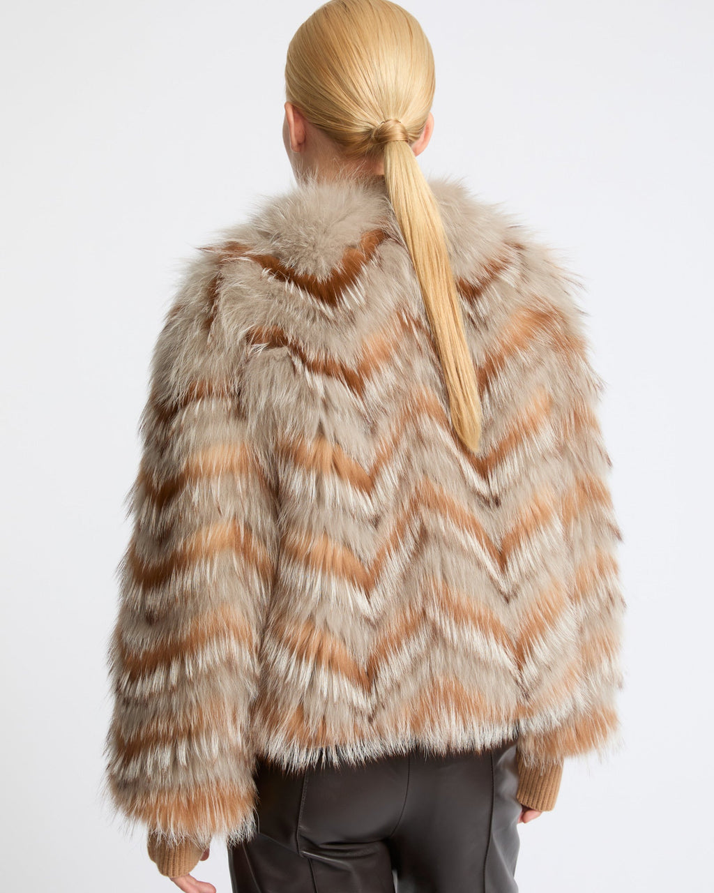Belted jacket in merino knit and fox fur