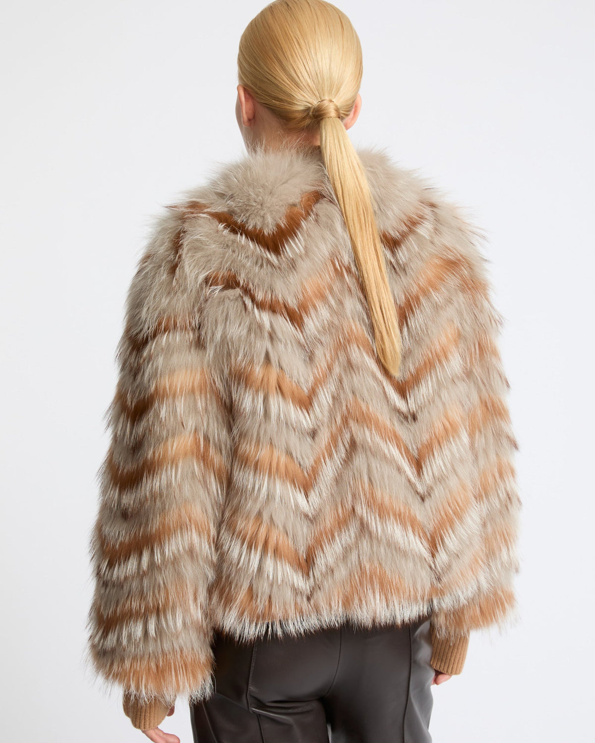 Belted jacket in merino knit and fox fur