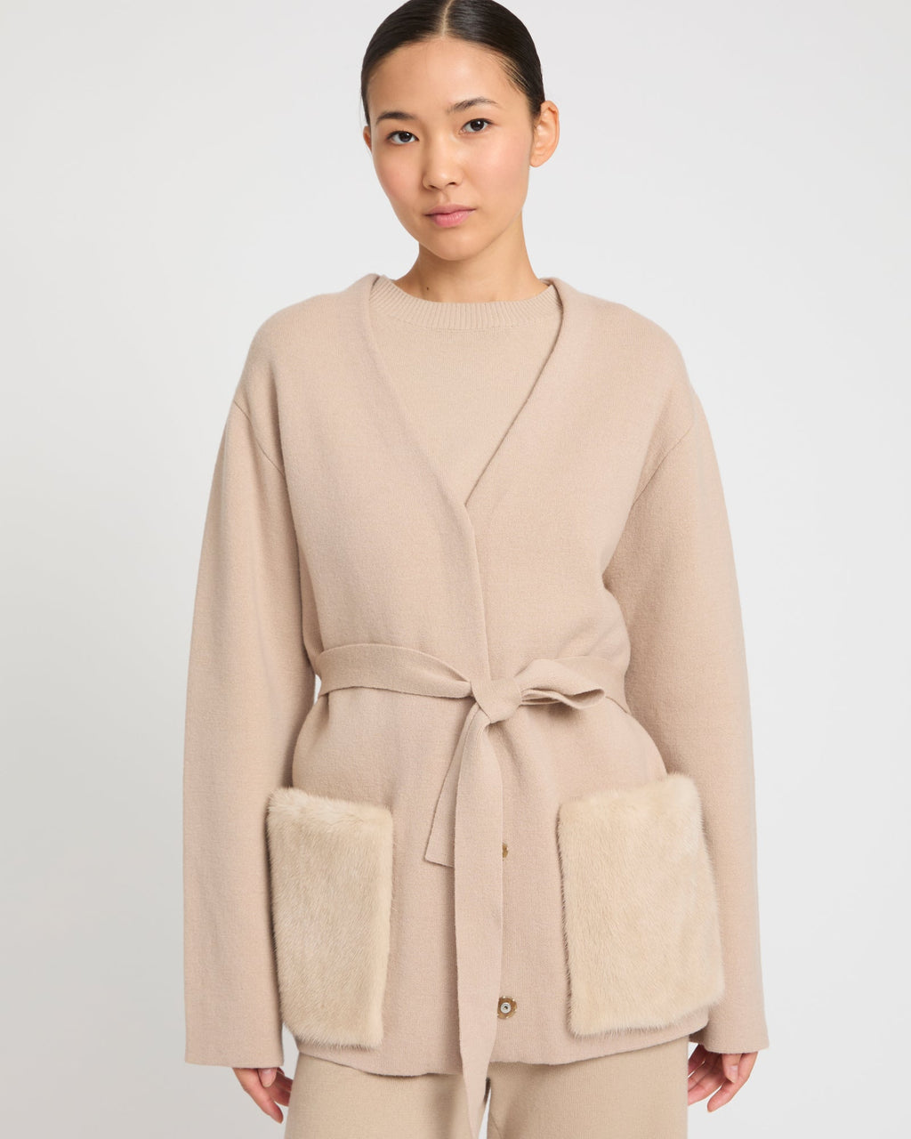 Belted knit and mink jacket