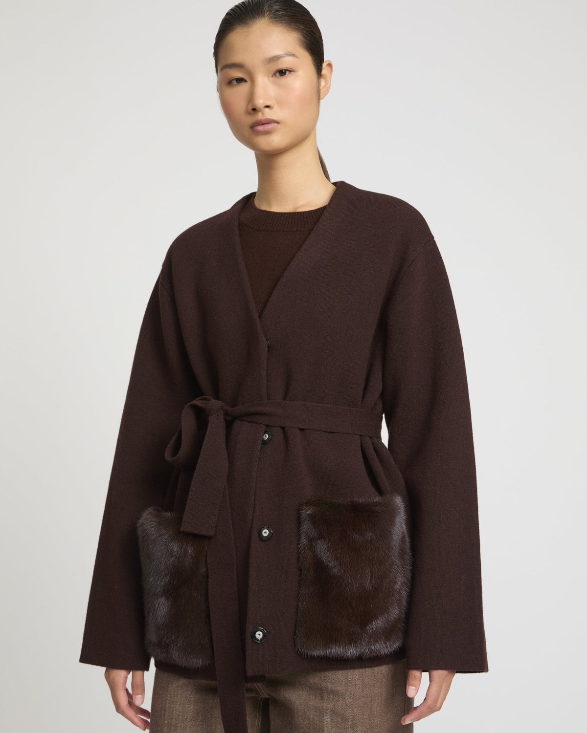 Belted knit and mink jacket