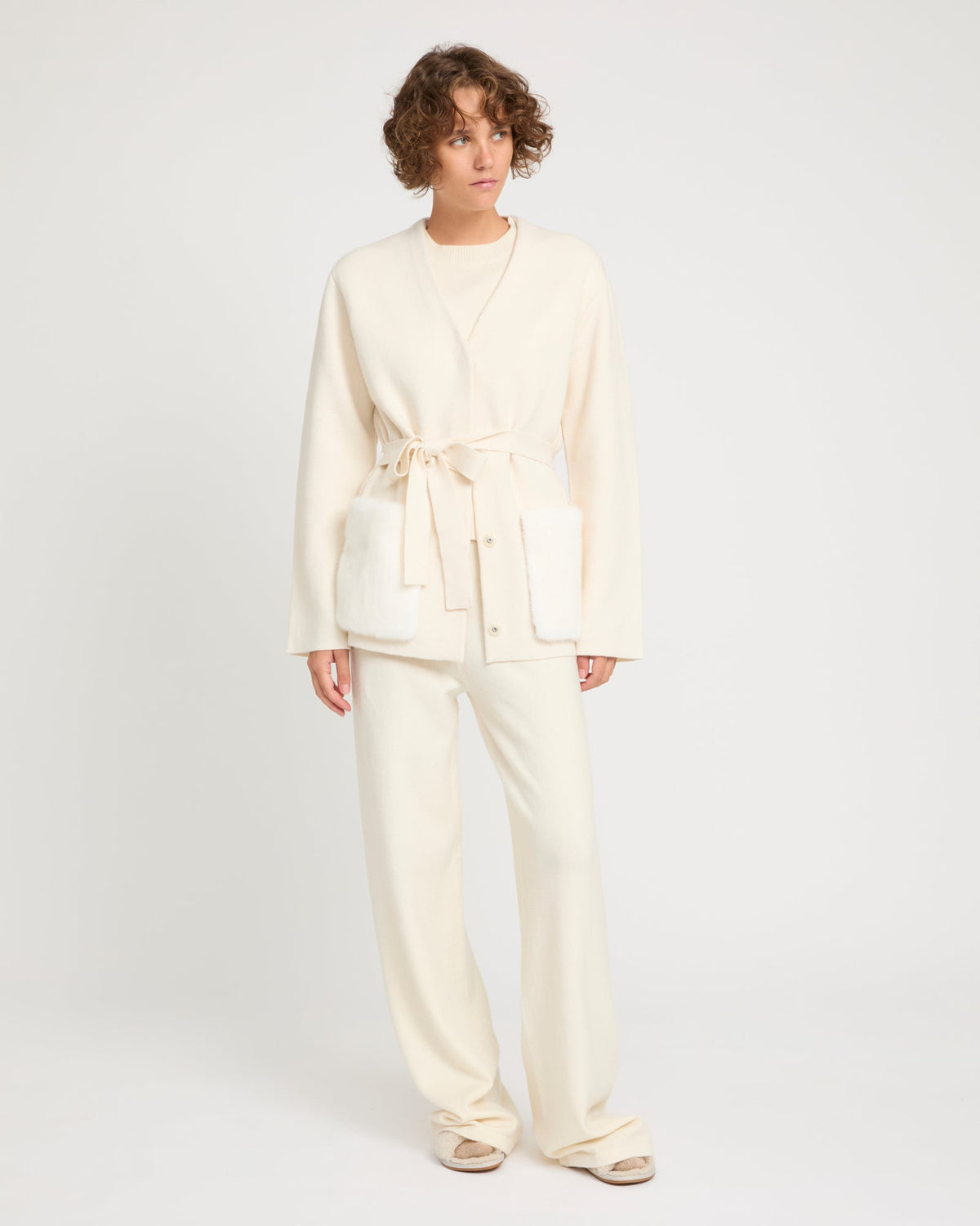 Belted knit and mink jacket