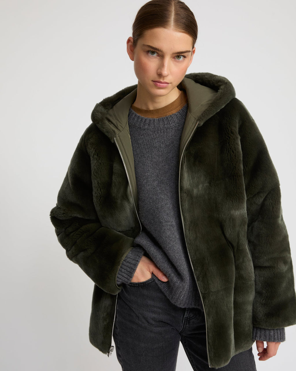 Reversible hooded jacket in rabbit rex fur and technical fabric