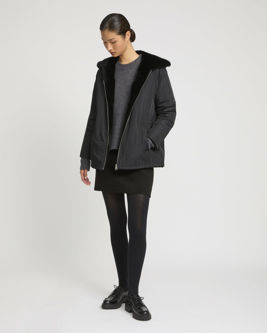 Reversible hooded jacket in rabbit rex fur and technical fabric