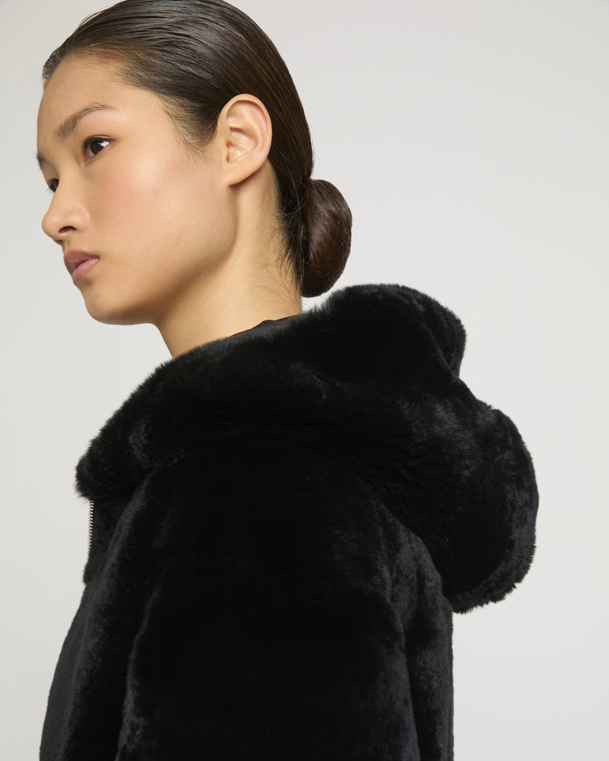 Reversible hooded jacket in rabbit rex fur and technical fabric