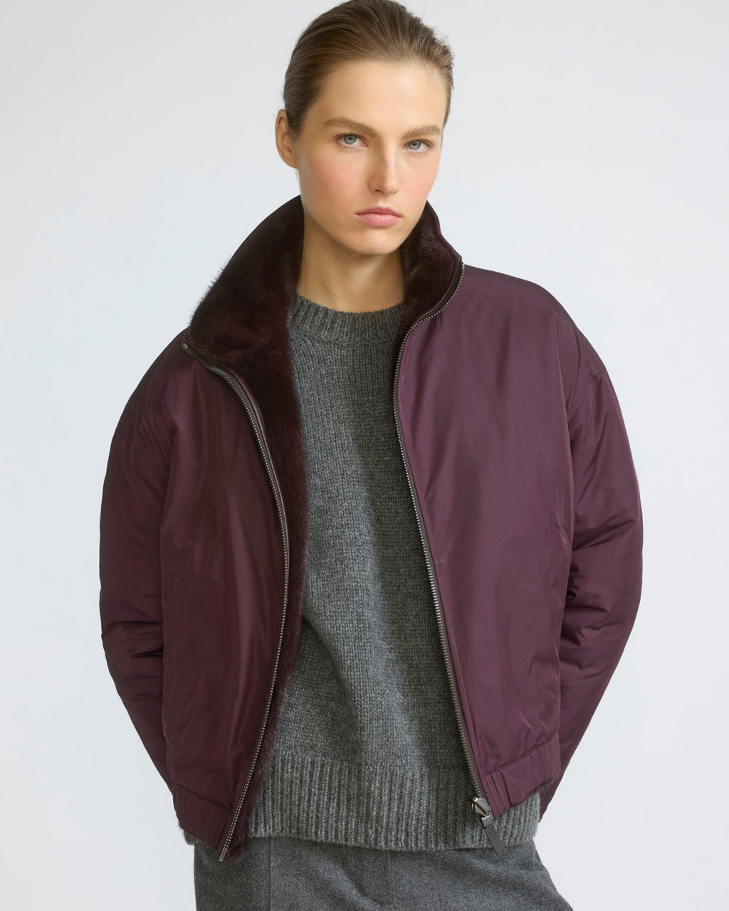 Reversible water-repellent technical fabric jacket with mink fur
