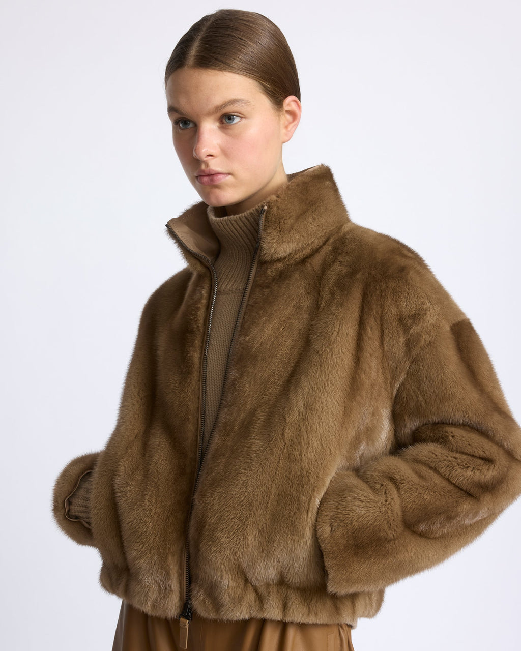 Reversible water-repellent technical fabric jacket with mink fur