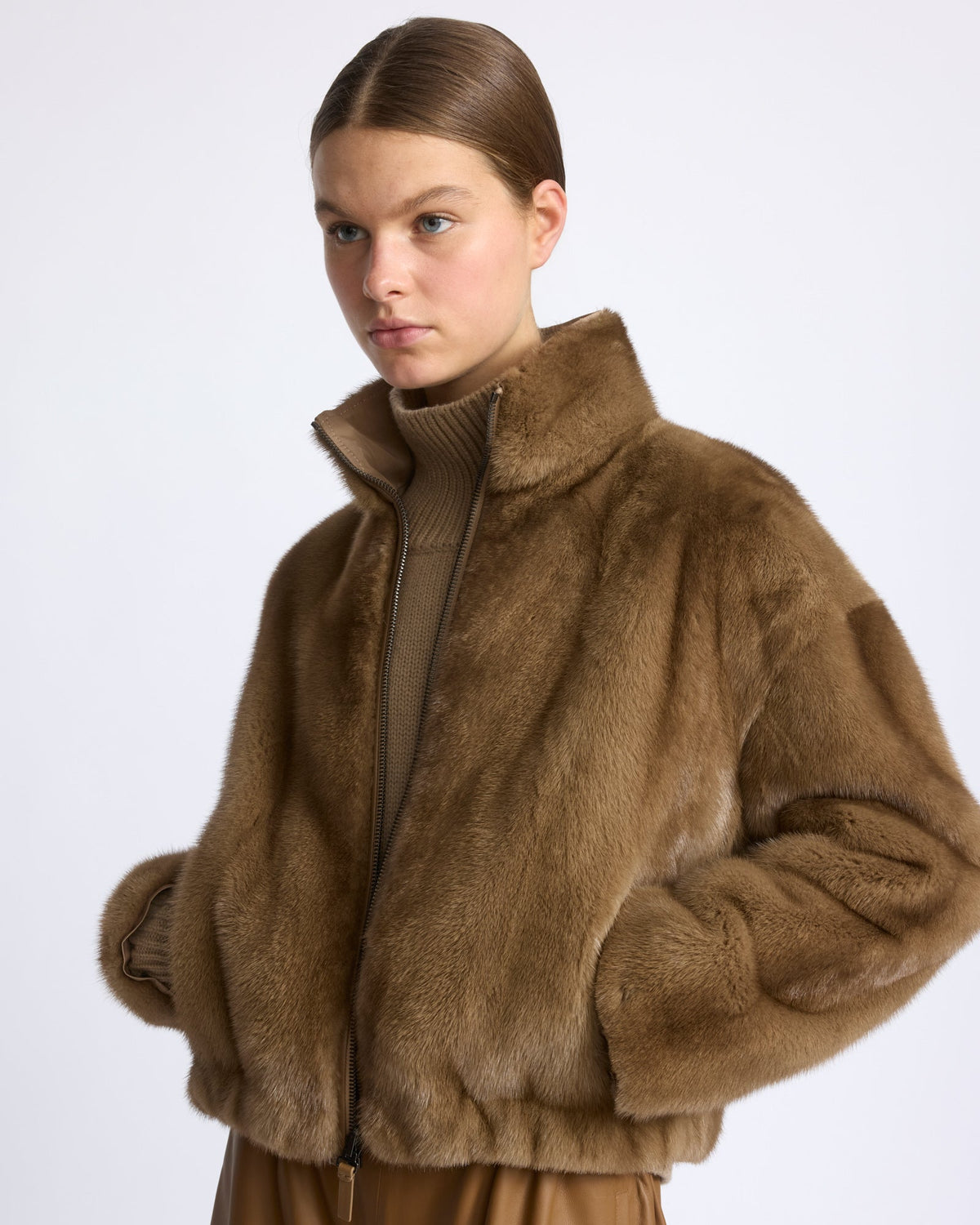 Reversible water-repellent technical fabric jacket with mink fur