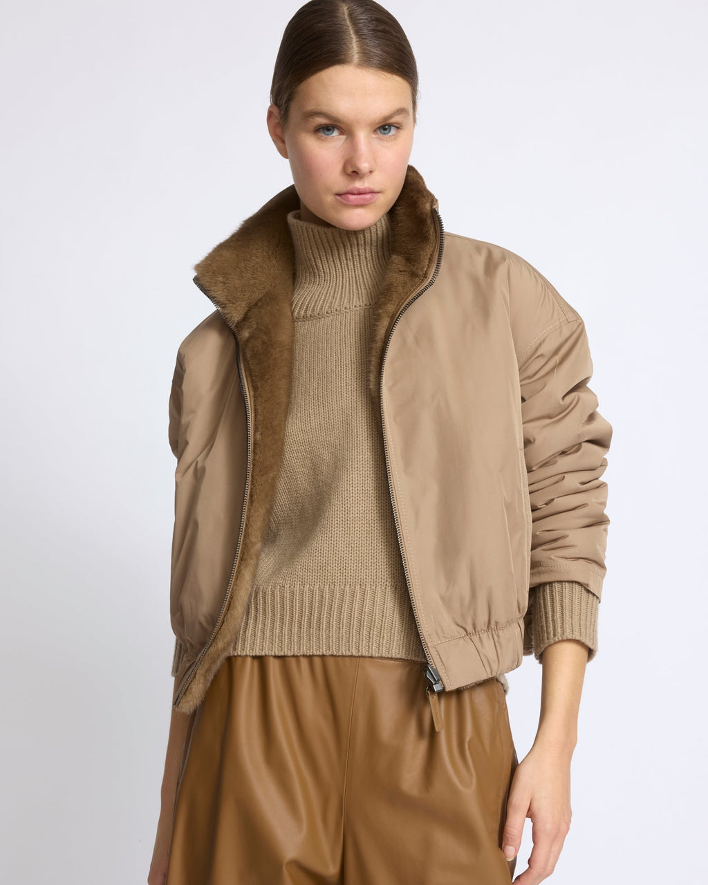 Reversible water-repellent technical fabric jacket with mink fur