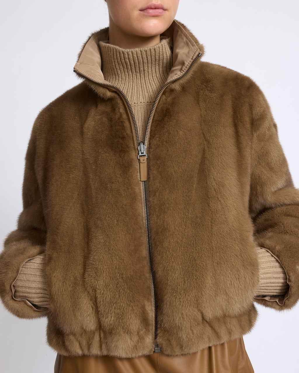 Reversible water-repellent technical fabric jacket with mink fur