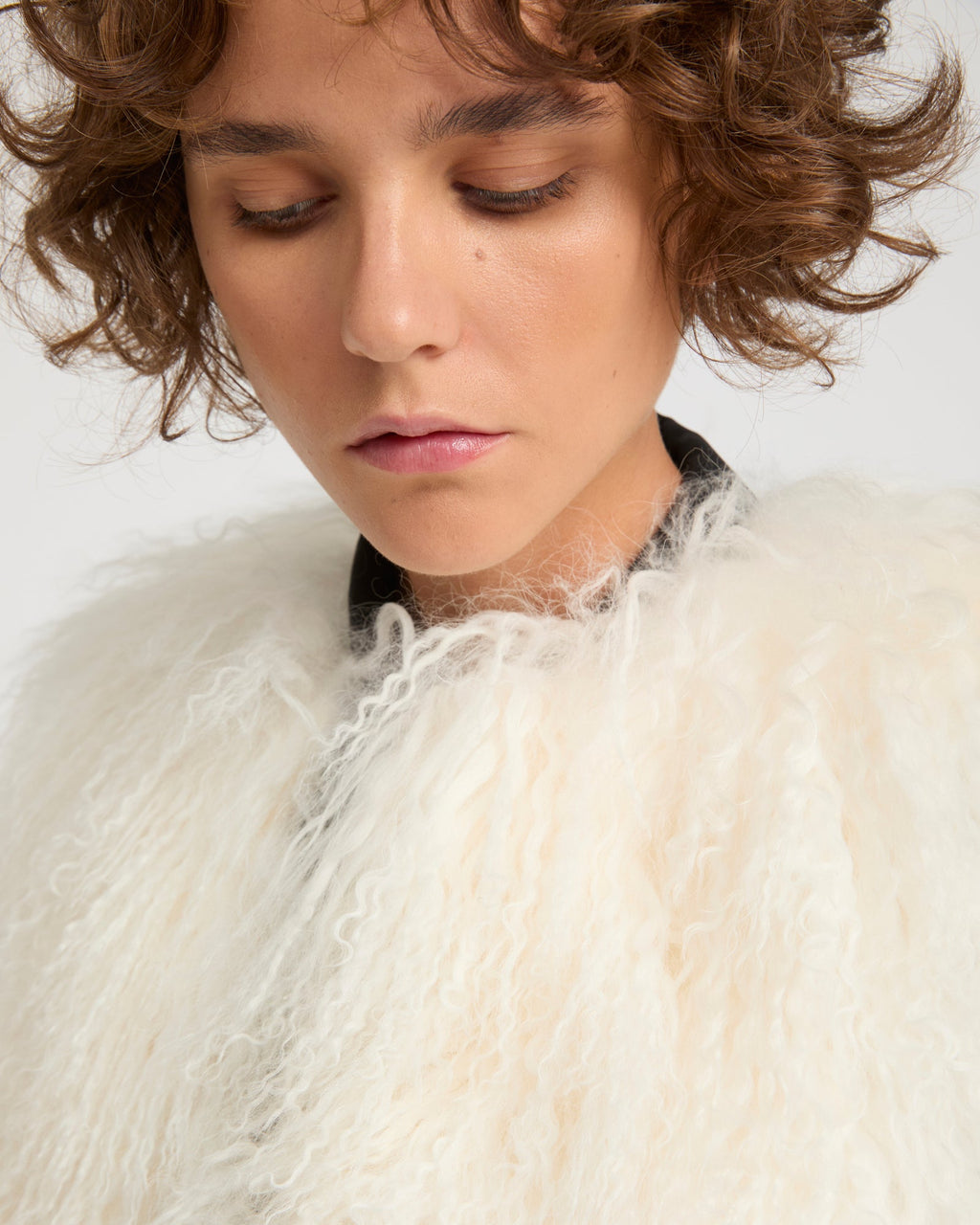 Sleeveless gilet in Mongolian lambskin