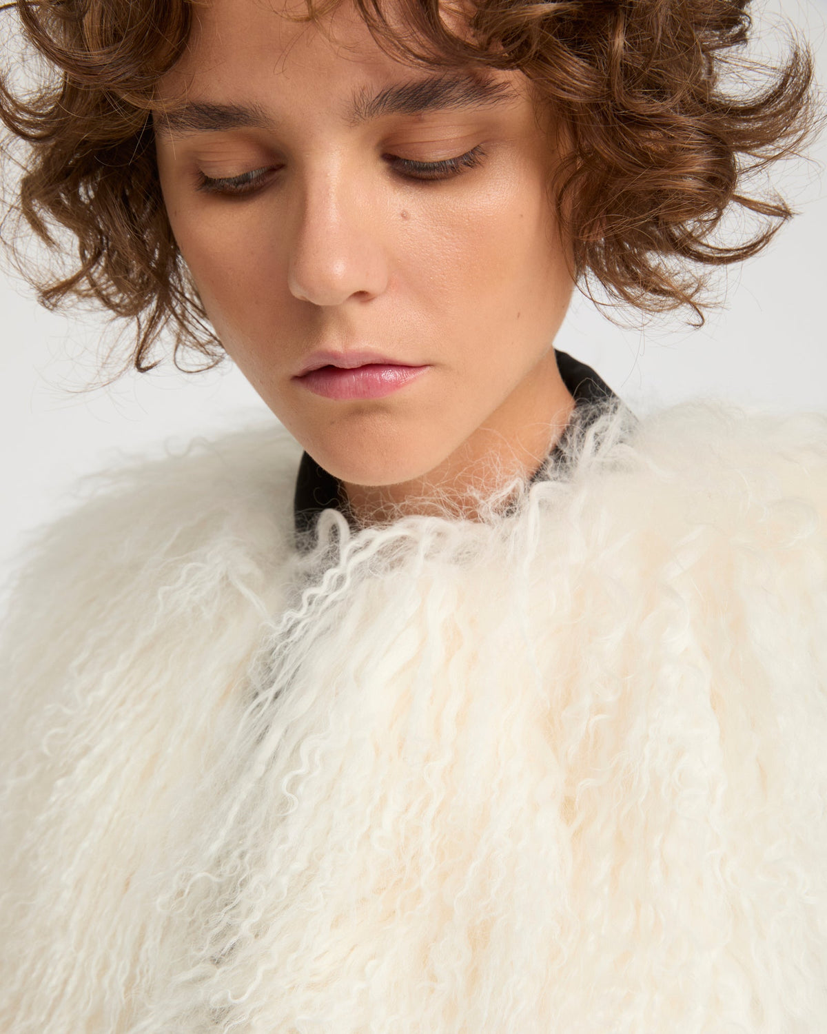 Sleeveless gilet in Mongolian lambskin