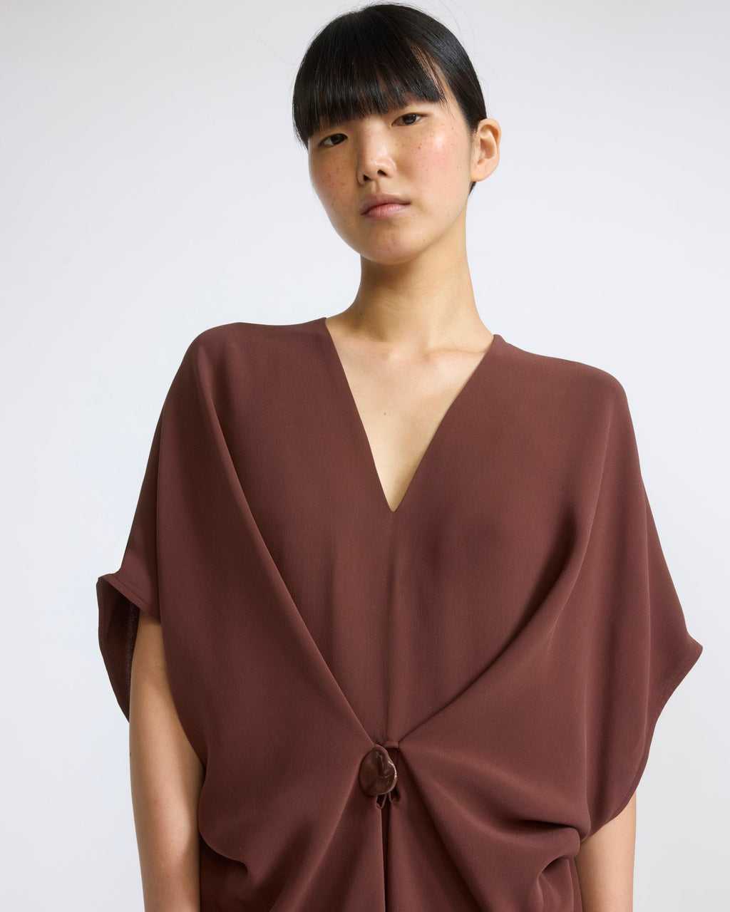 Draped dress in silk crepe