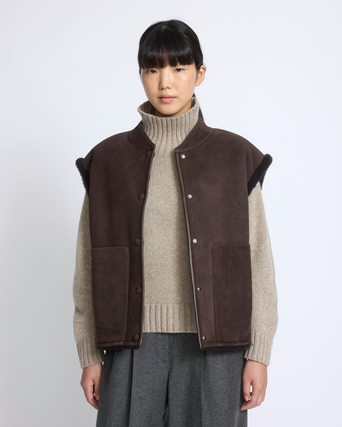 Curly Merino lambskin sleeveless gilet