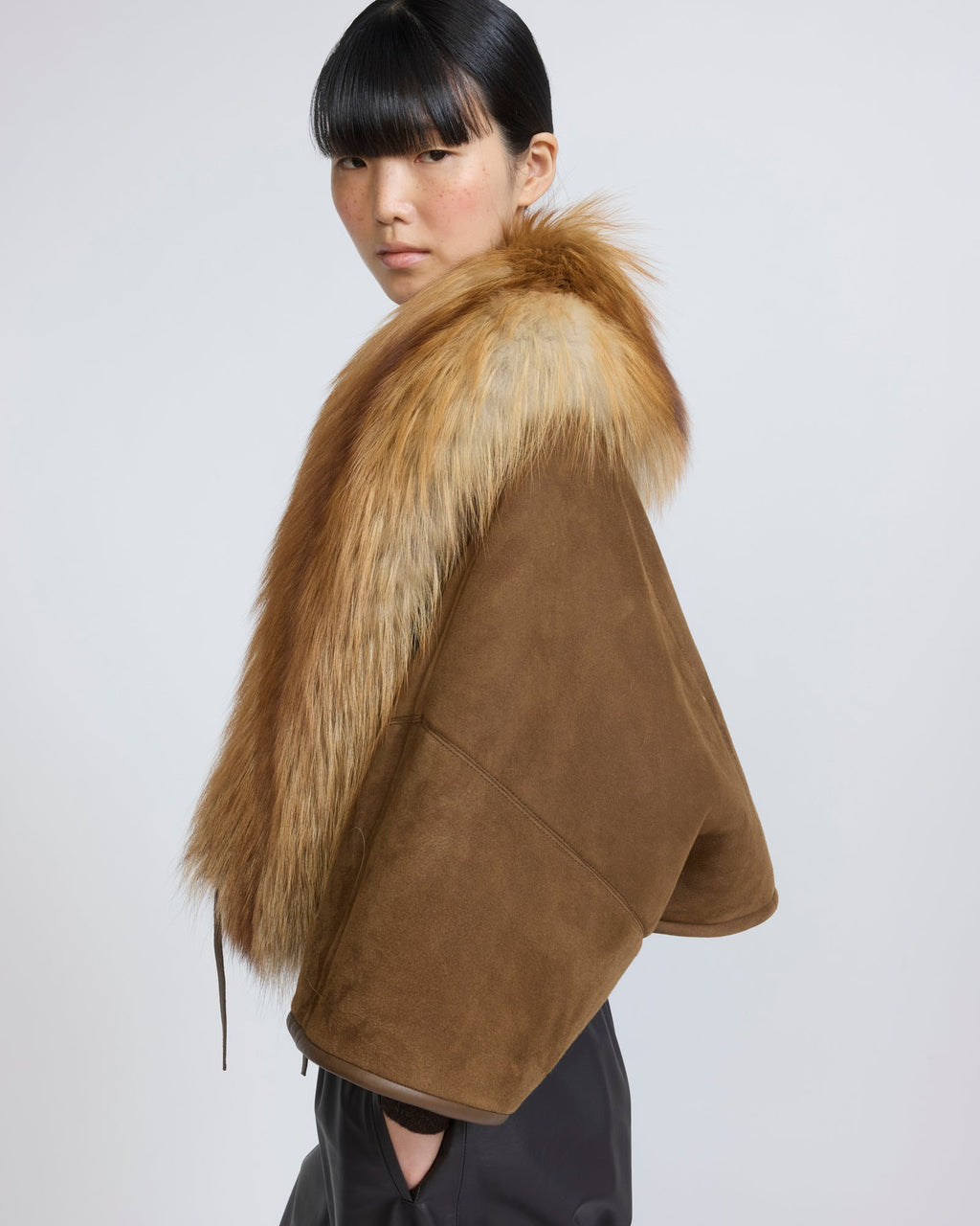 Lambskin shearling cape with fox fur collar