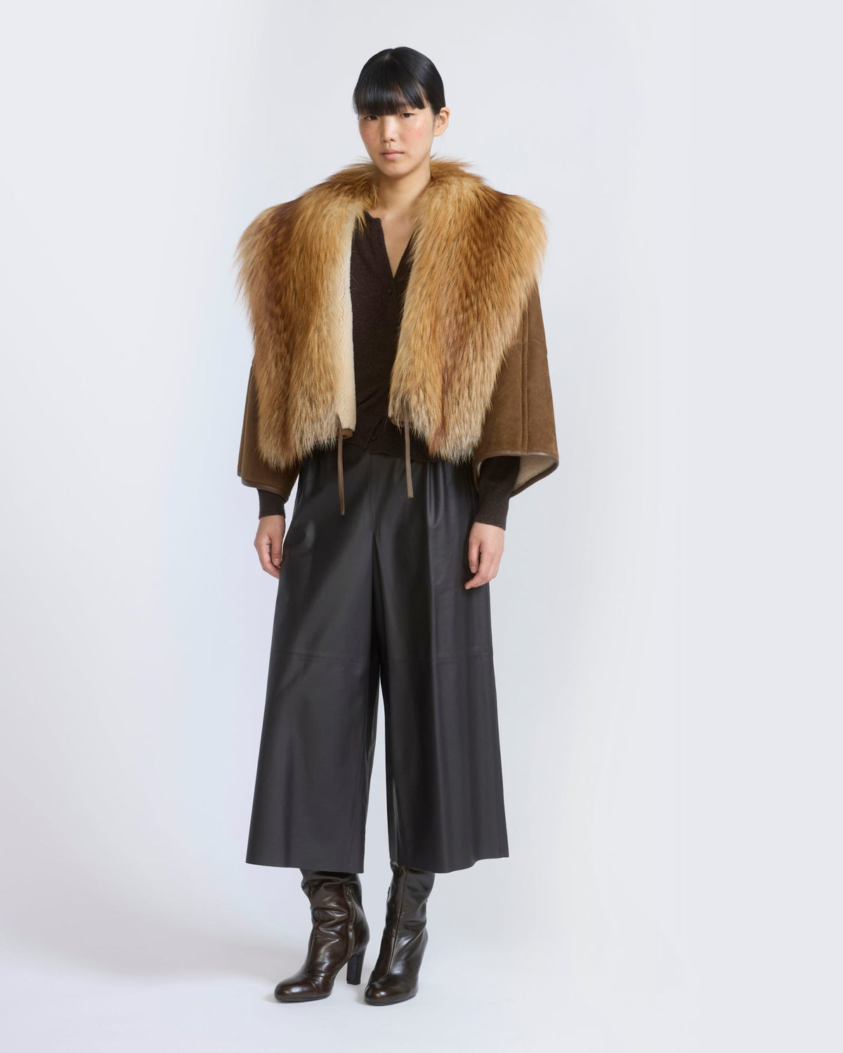 Lambskin shearling cape with fox fur collar