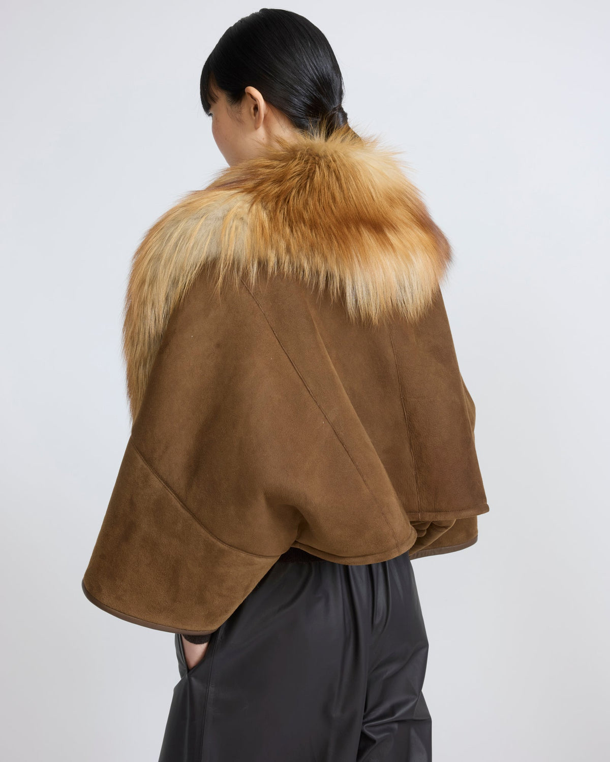 Lambskin shearling cape with fox fur collar