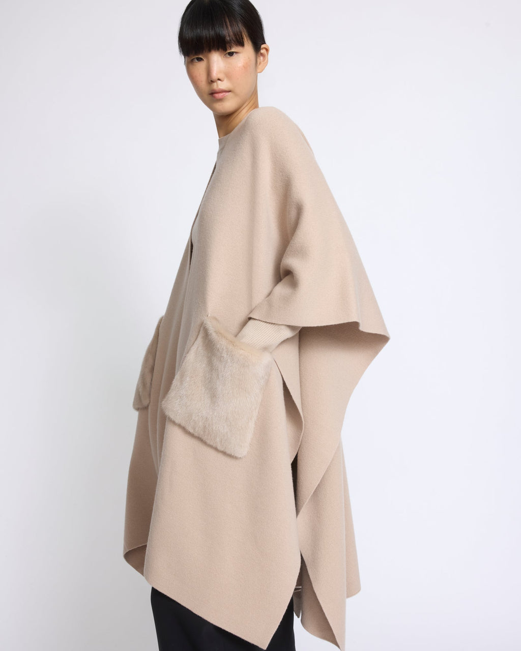 Merino knit poncho with mink fur