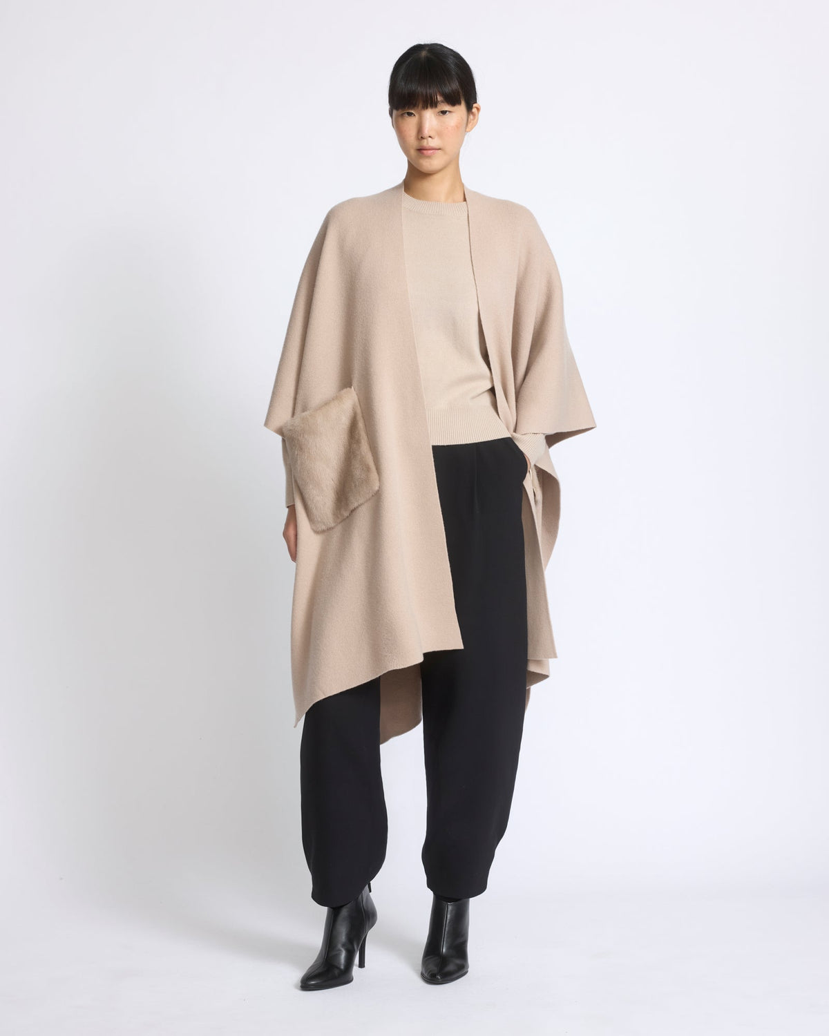 Merino knit poncho with mink fur