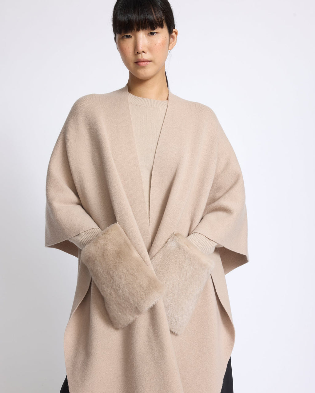 Merino knit poncho with mink fur