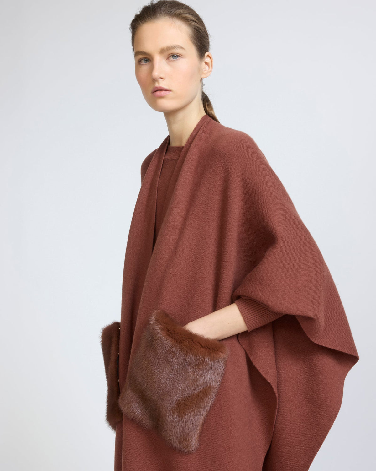 Merino knit poncho with mink fur