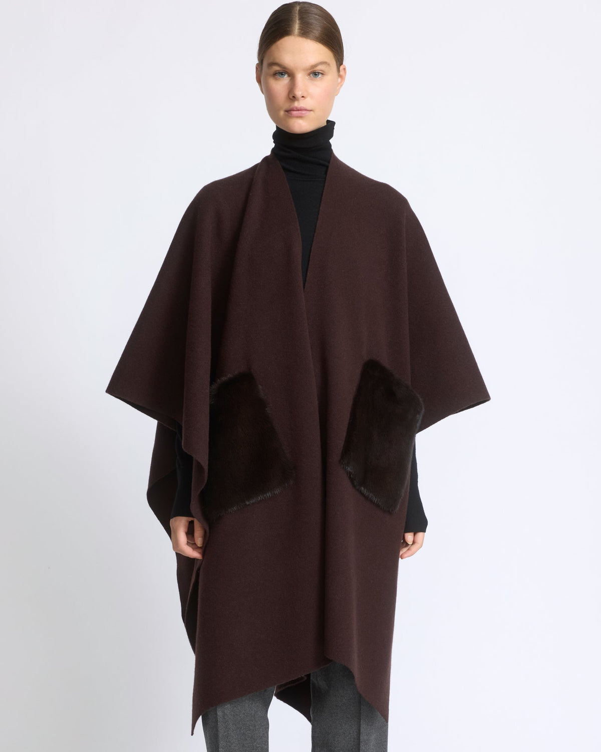 Merino knit poncho with mink fur