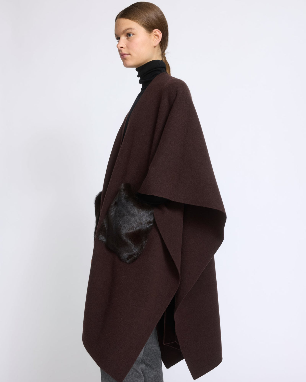 Merino knit poncho with mink fur