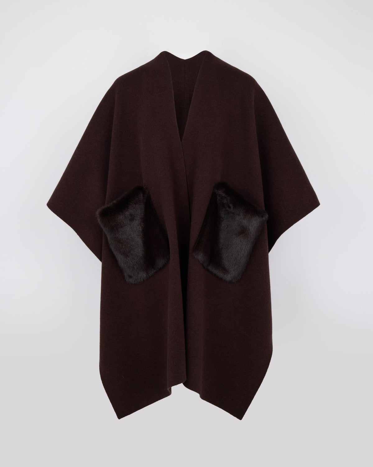 Merino knit poncho with mink fur
