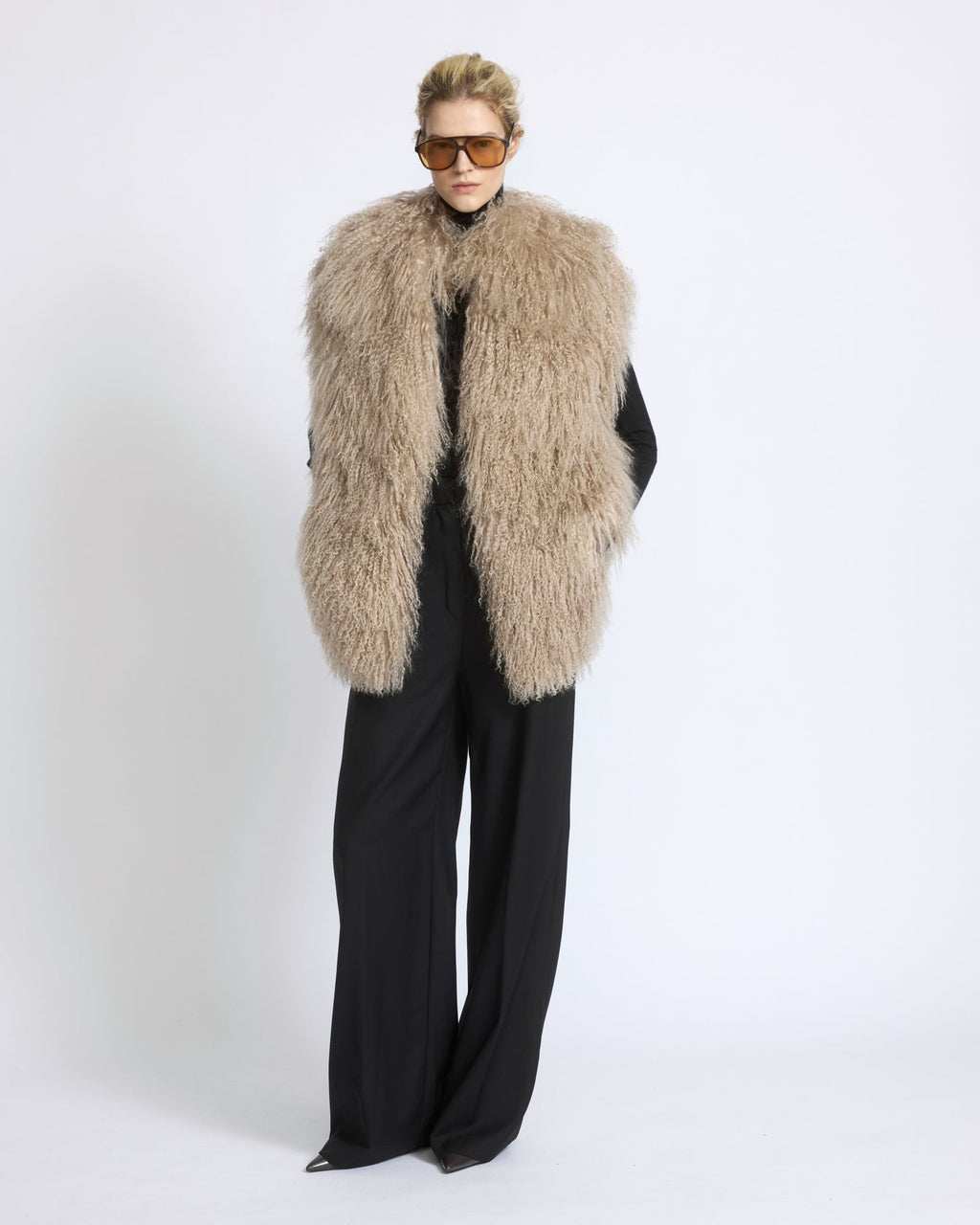 Merino knit gilet with curly long-haired lambskin
