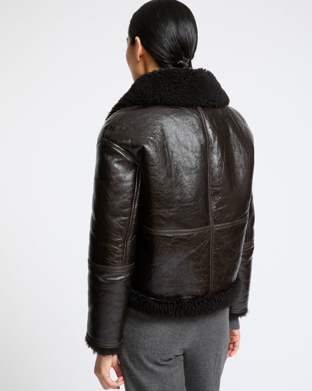 Short varnished Merinillo lambskin shearling jacket