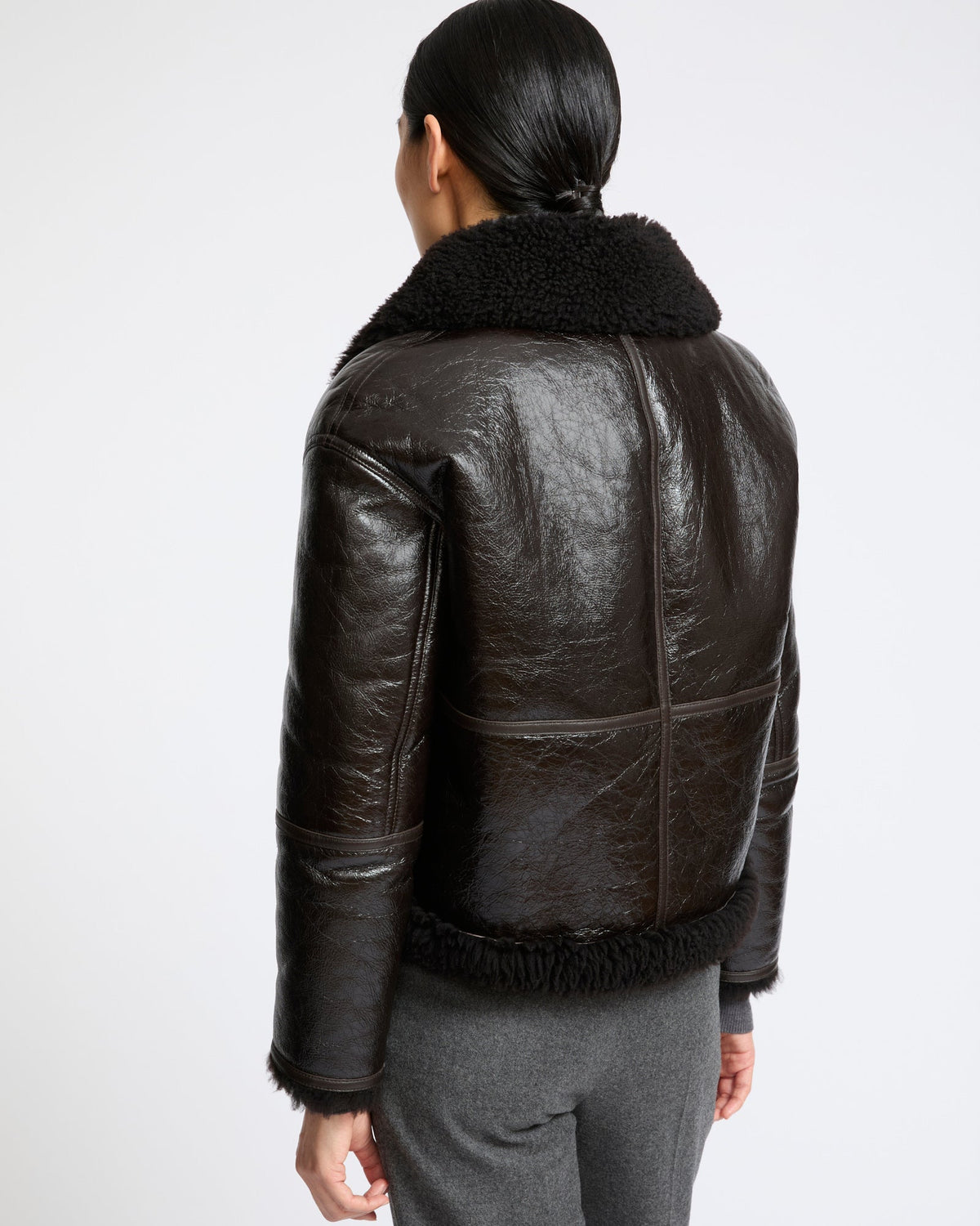 Short varnished Merinillo lambskin shearling jacket